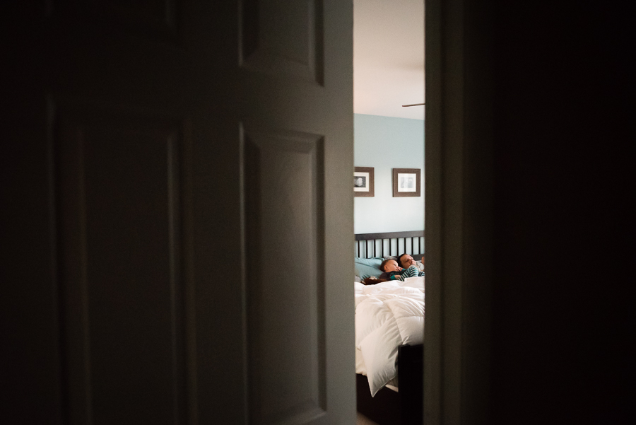 Creative-Framing-through-Doorway-Peeking-in-on-Son-and-Dad-by-Nicole-Sanchez