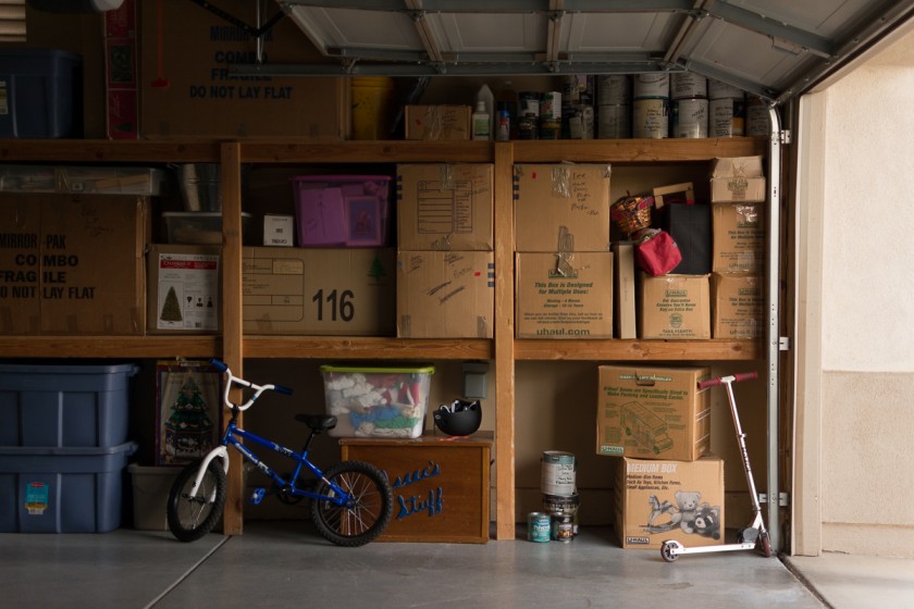 garage pullback full of shelves and boxes by Kerry Lee