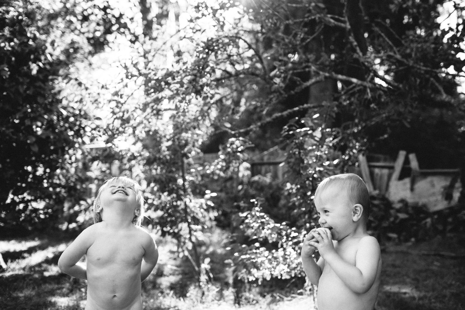 black and white pic of two boys outdoors by Meghan McMackin