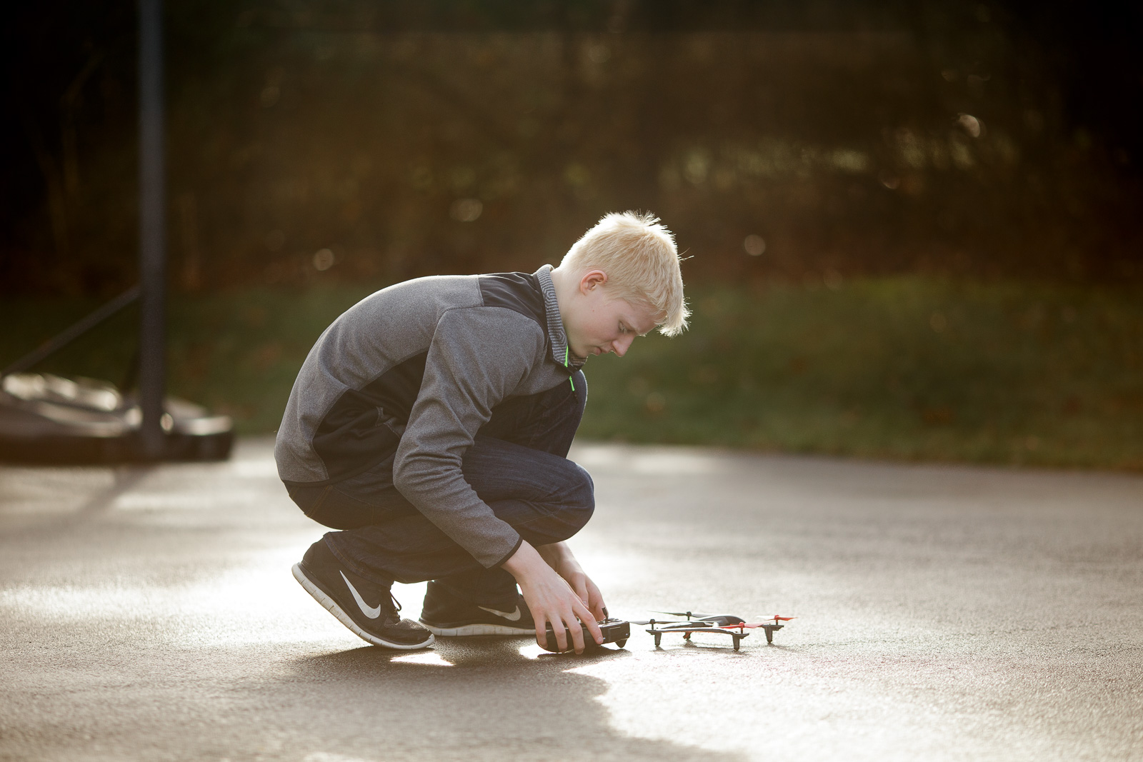pic of teen with a remote control airplane by Amy Nowak