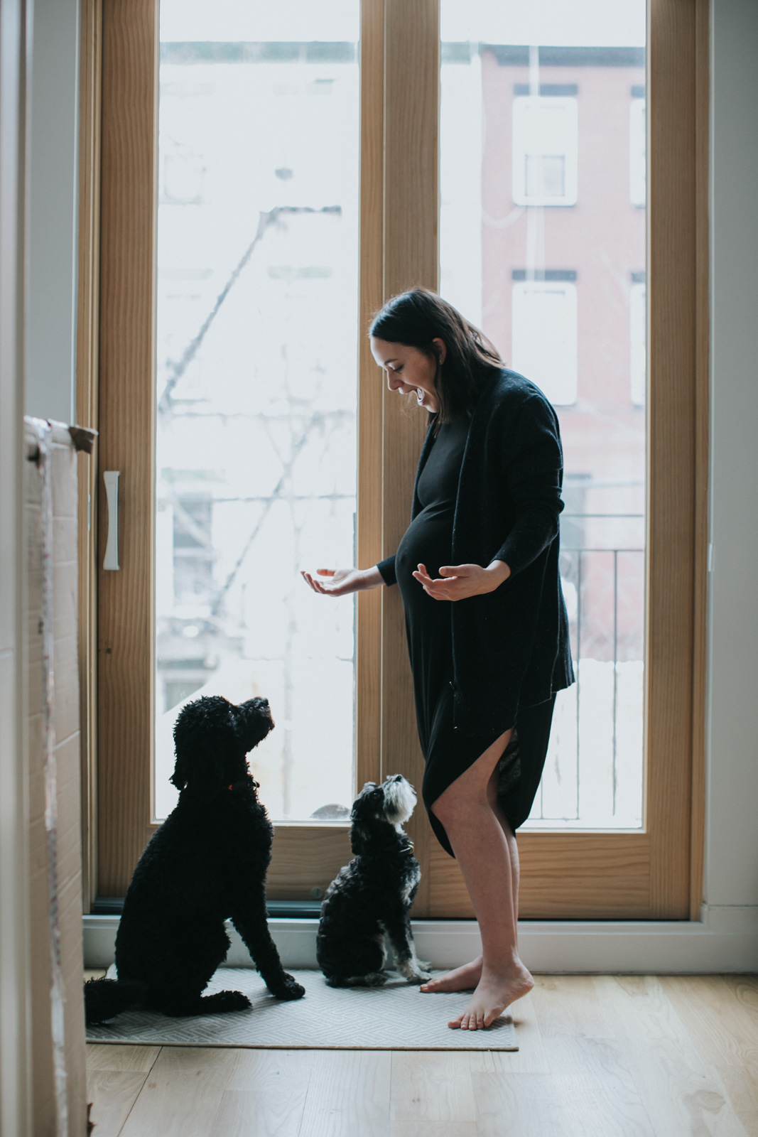 lifestyle intimate boudoir maternity photography mom talking to dogs amy hanen